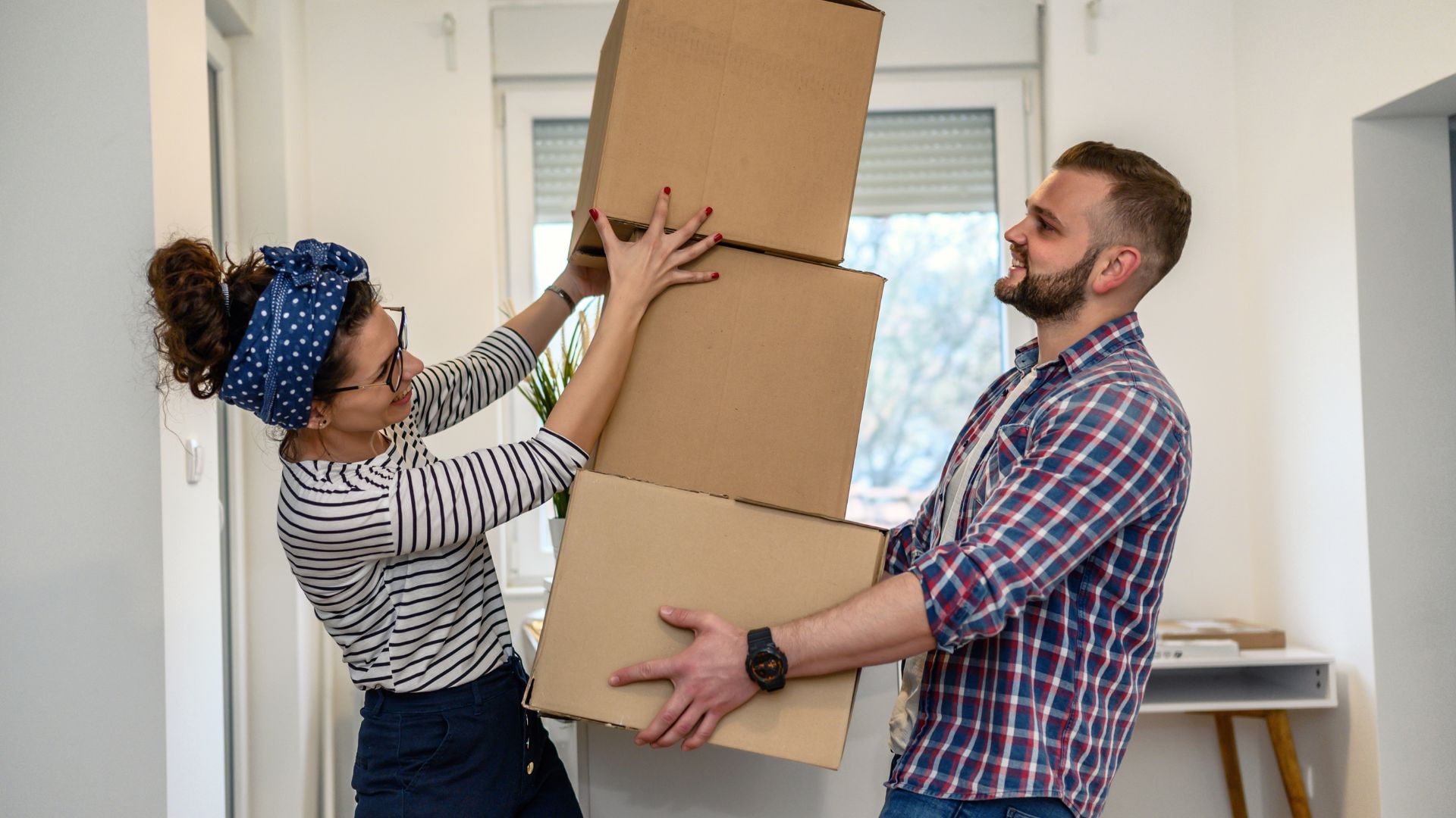 Dhaka-Movers-team-carefully-packing-fragile-items