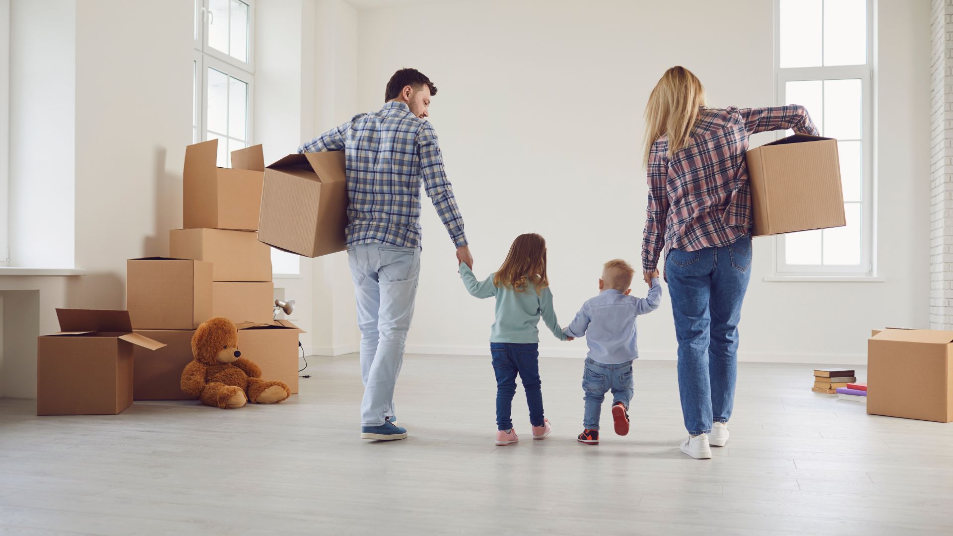 Happy-family-after-house-shifting-with-Dhaka-Movers